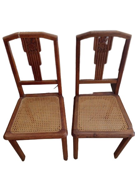 Paire de chaises en bois ancien et cannage.
